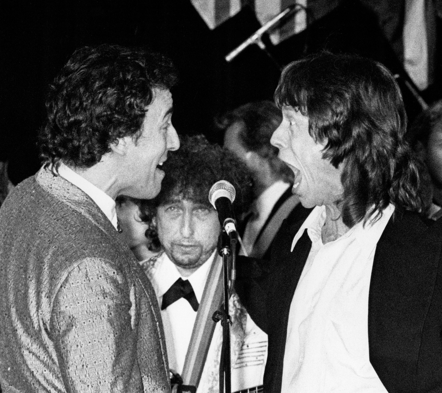 Bruce Springsteen, Bob, Dylan, and Mick Jagger (left to right) perform during the 3rd Annual Rock and Roll Hall of Fame Induction Ceremony. Jan. 20, 1988