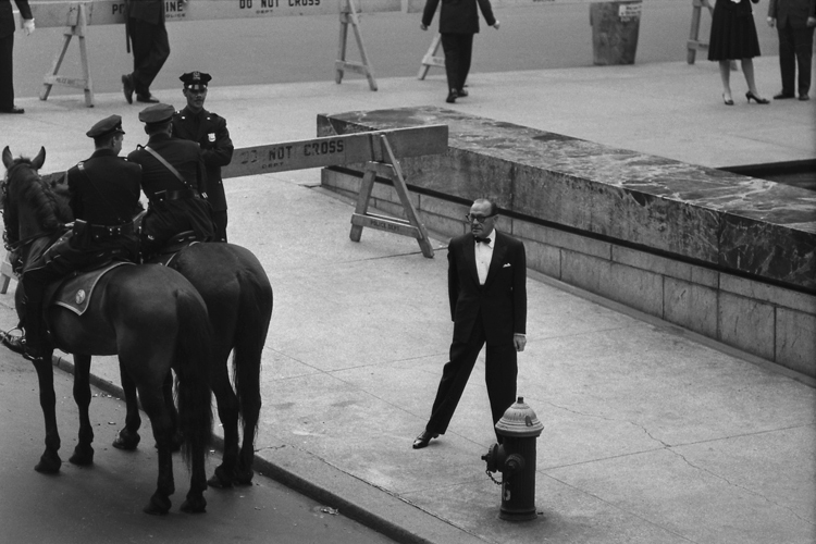 The great comedian Jack Benny on the sidewalk outside Madison Square Garden prior to attending a "Birthday Salute" honor of JFK, New York, May 19, 1962.