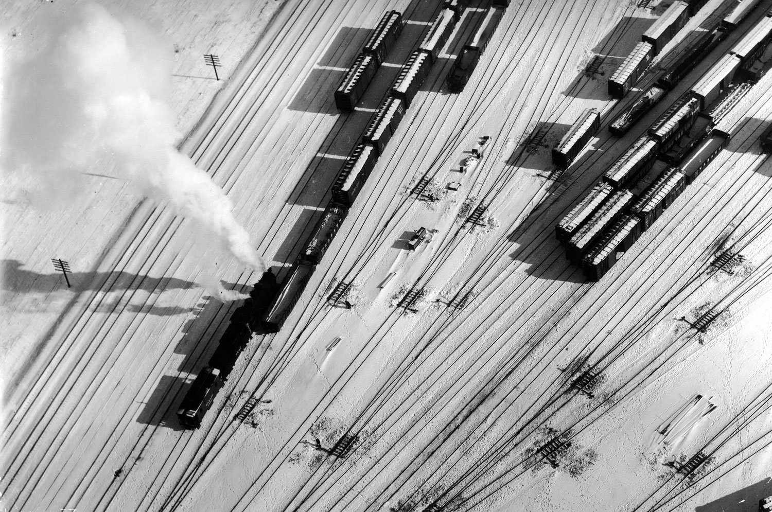 Trains after snowfall, Chicago, photographed from a helicopter, 1952.