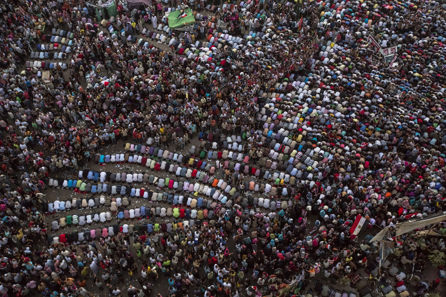 June 24, 2012, Cairo. Hundreds in the crowd pray as they celebrate the election of Mohamed Morsy in Tahrir Square.