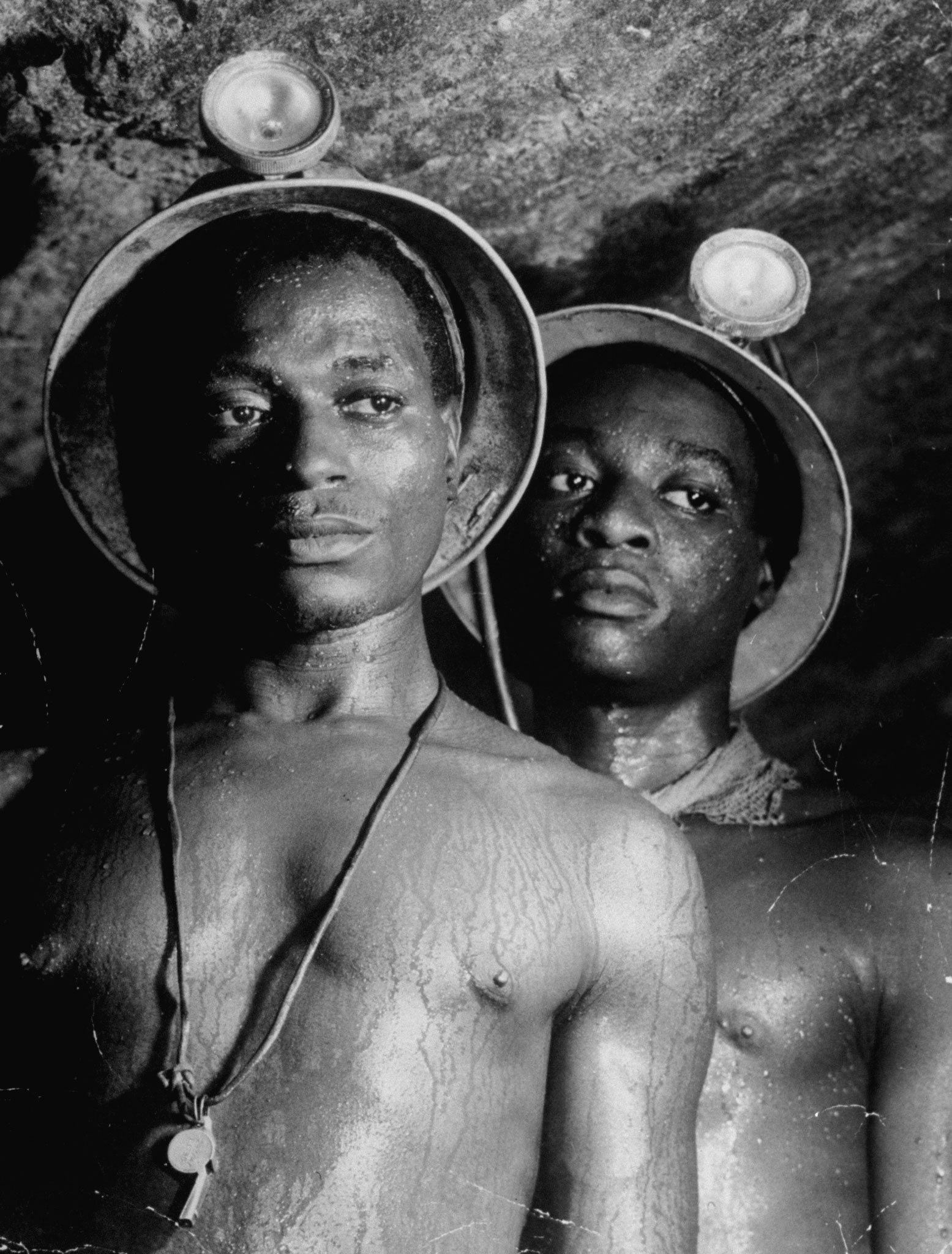 South African gold miners, photographed more than a mile underground, 1950.