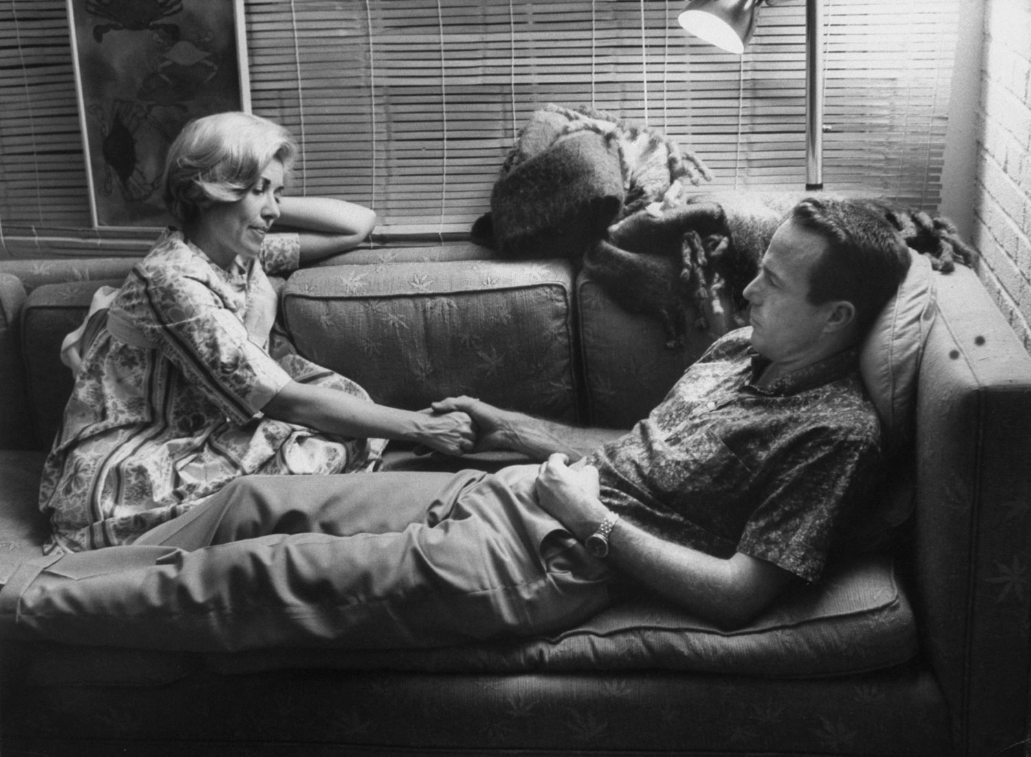 Scott Carpenter and his wife Rene talk late at night, Florida, 1962.