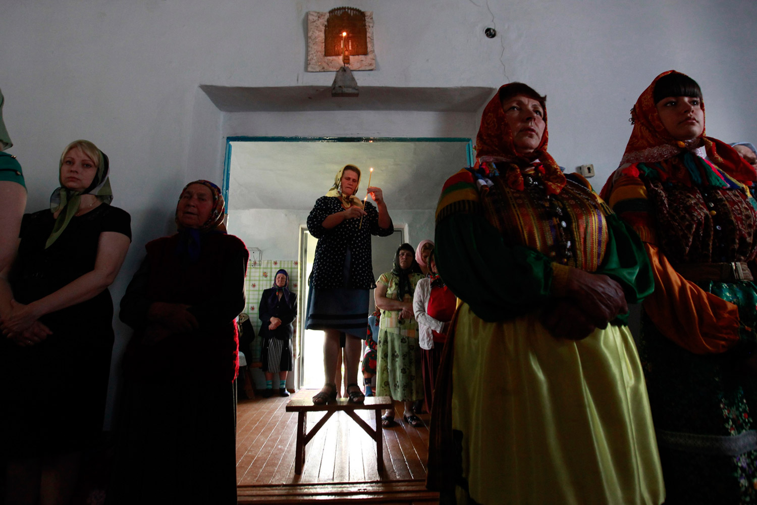 June 3, 2012. Orthodox Old Believer Nekrasov Cossacks attend a service to celebrate Pentecost in the village of Kumskaya Dolina, west of Stavropol, Russia.