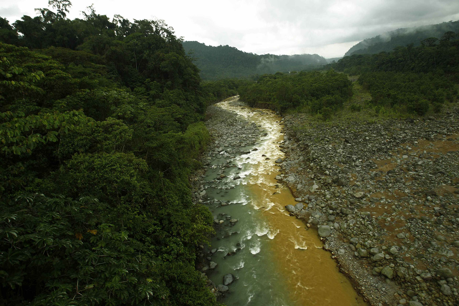 June 5, 2012. The Rio Sucio or  Dirty River,  where one branch is colored yellow/brown by the minerals it carries from the Irazu Volcano, is seen mixing with the clear waters filtered by the tropical rainforest in the Braullio Carrillo National Park, 50 km (31 miles) east of San Jose.