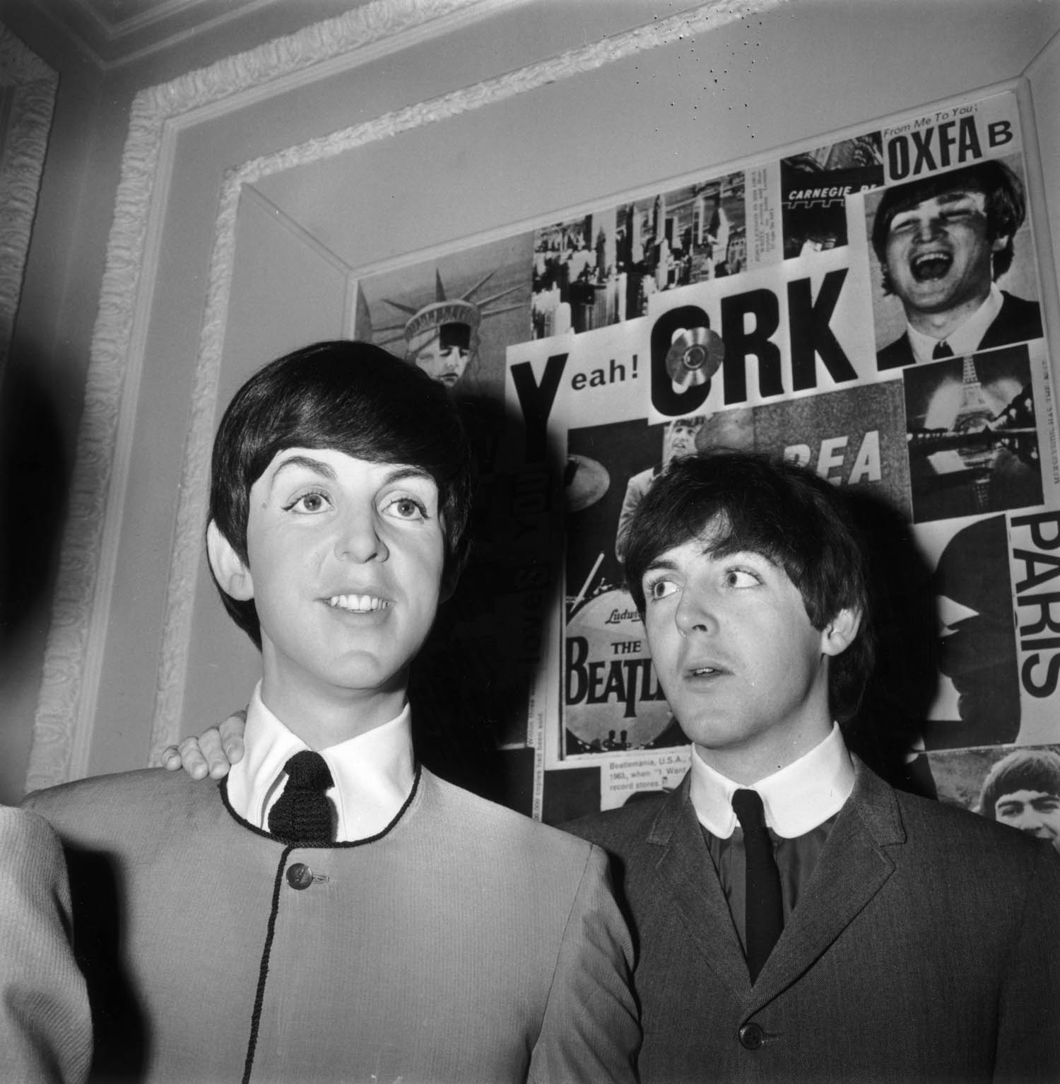 Paul McCartney at Madame Tussaud's waxworks with his newly unveiled effigy in London, England, April 29, 1964.