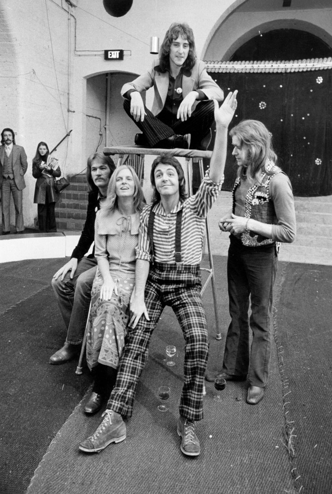 Former Beatle Paul McCartney with his wife Linda and their pop group Wings, 1972.