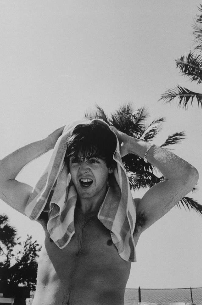 Paul McCartney, member of British rock group, The Beatles, at poolside of the Deauville Hotel Miami, Florida. February 16, 1964.