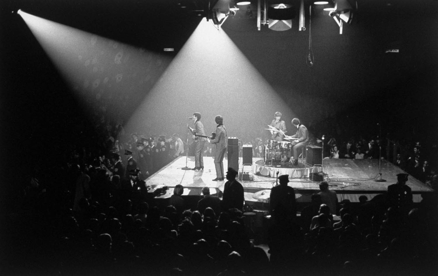 The Beatles on stage at the Washington Coliseum, Washington DC, February 11, 1964.