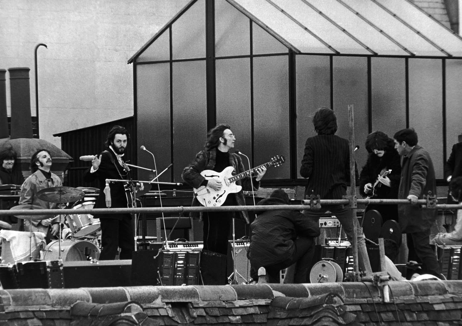 British pop band The Beatles, aka John Lennon, Paul McCartney, George Harrison and Ringo Starr, staging their final, legendary public performance on the rooftop of the Apple Corps HQ at 3 Saville Row in London, January 30th 1969.