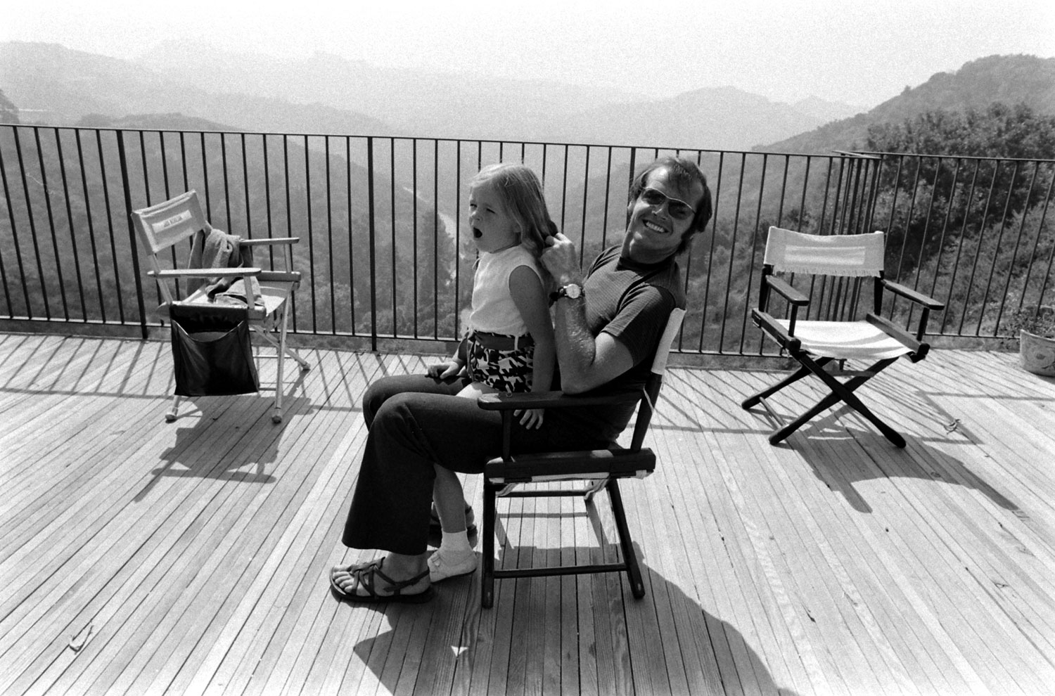 Jack Nicholson plays with his daughter, Jennifer, on the deck of his home overlooking Franklin Canyon, Los Angeles, 1969.