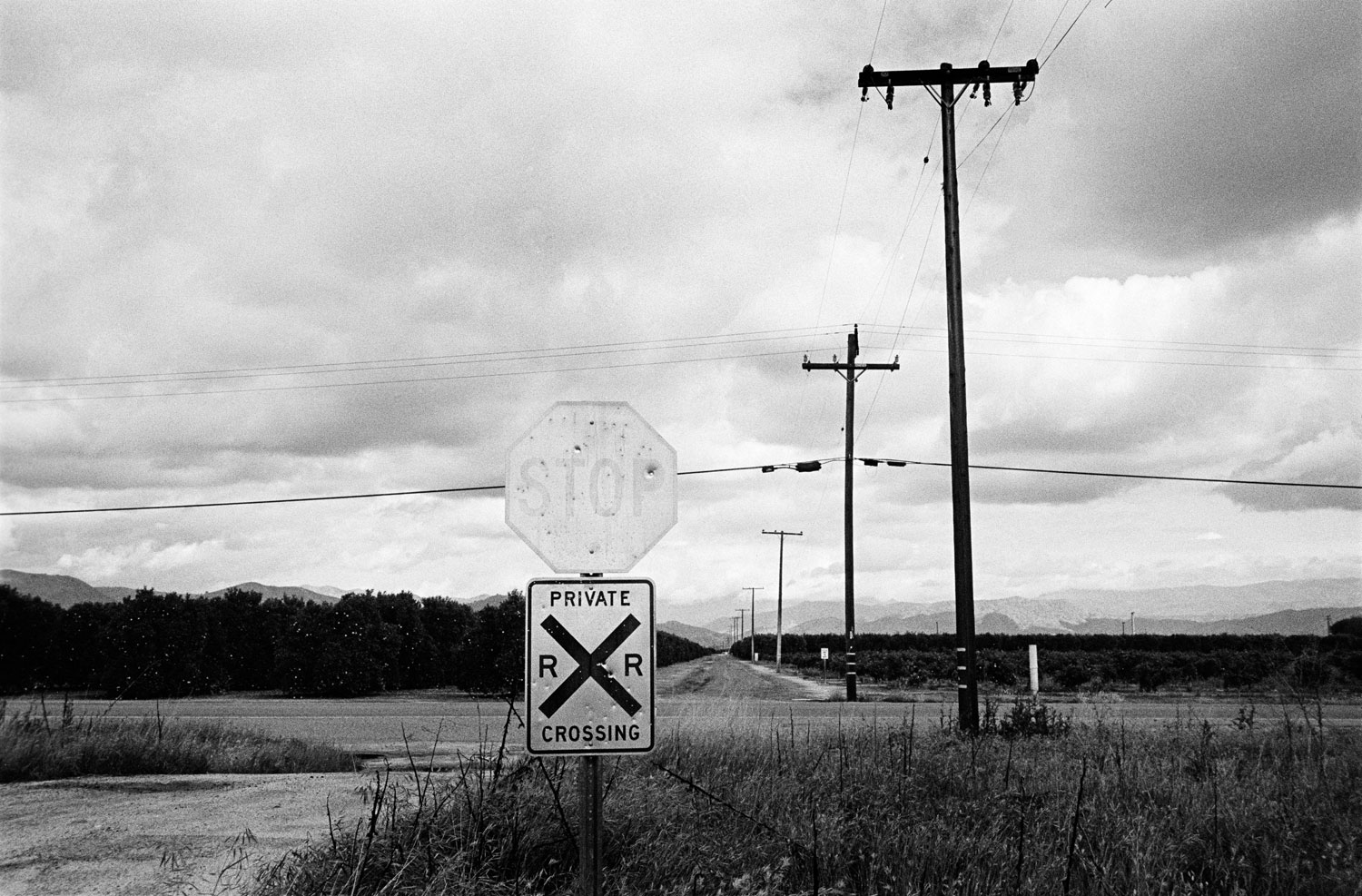 Railroad crossing. Woodlake, Calif., 2012.