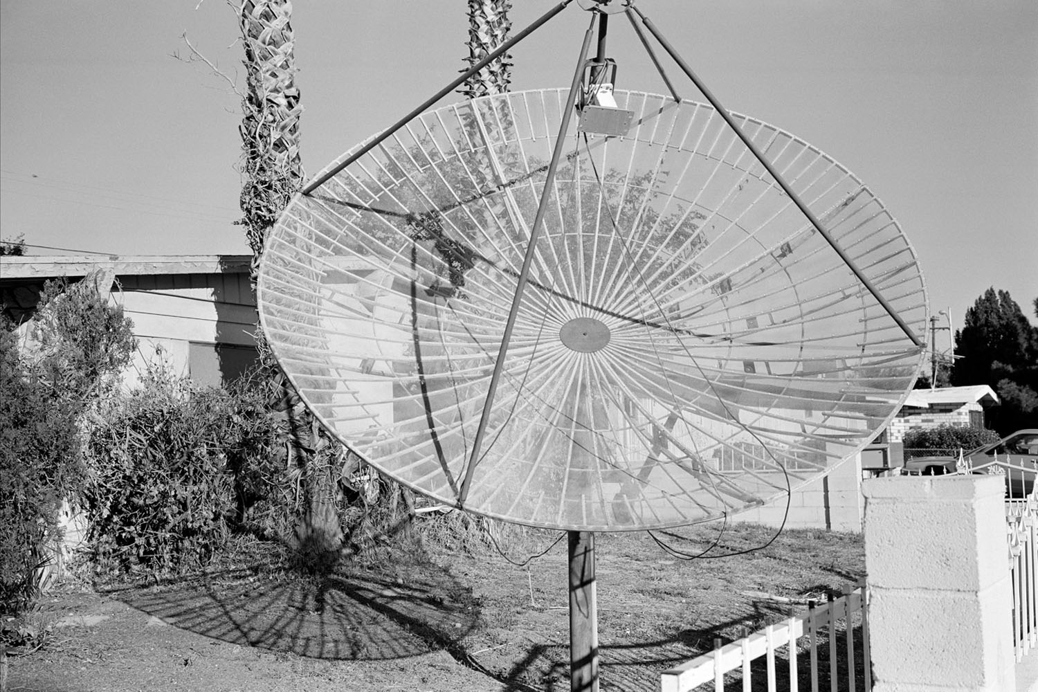 USA. Las Vegas, Nevada. November, 2011. Satellite dish in front of a foreclosed house.