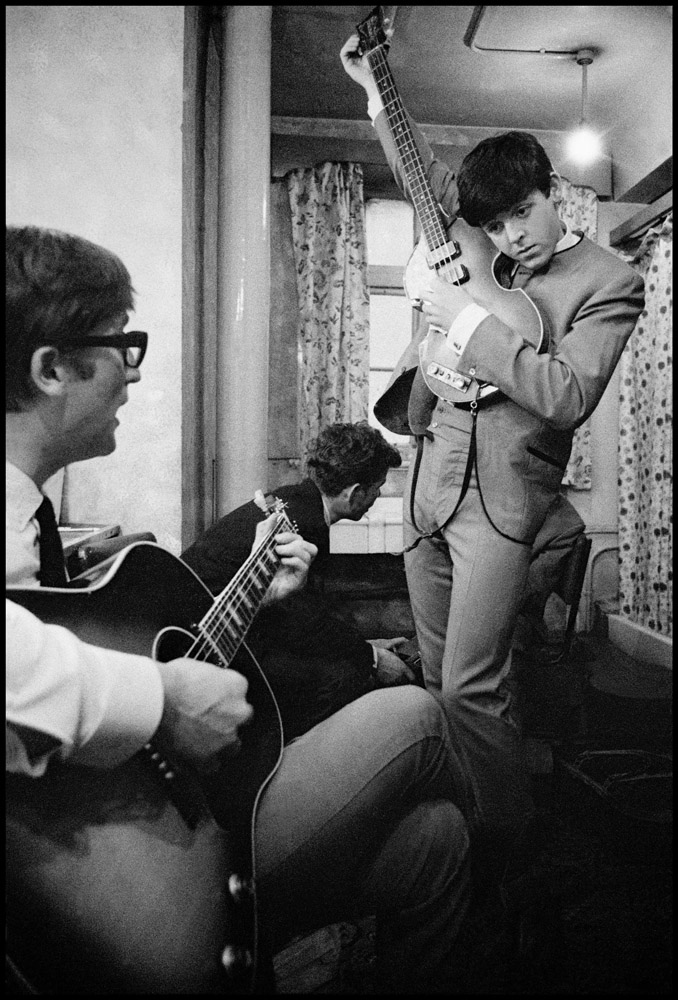 John Lennon and Paul McCartney with guitars. England, 1963.