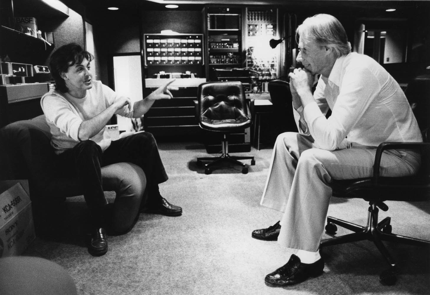 Paul McCartney and record producer/friend George Martin pictured together at a London recording studio in 1982.