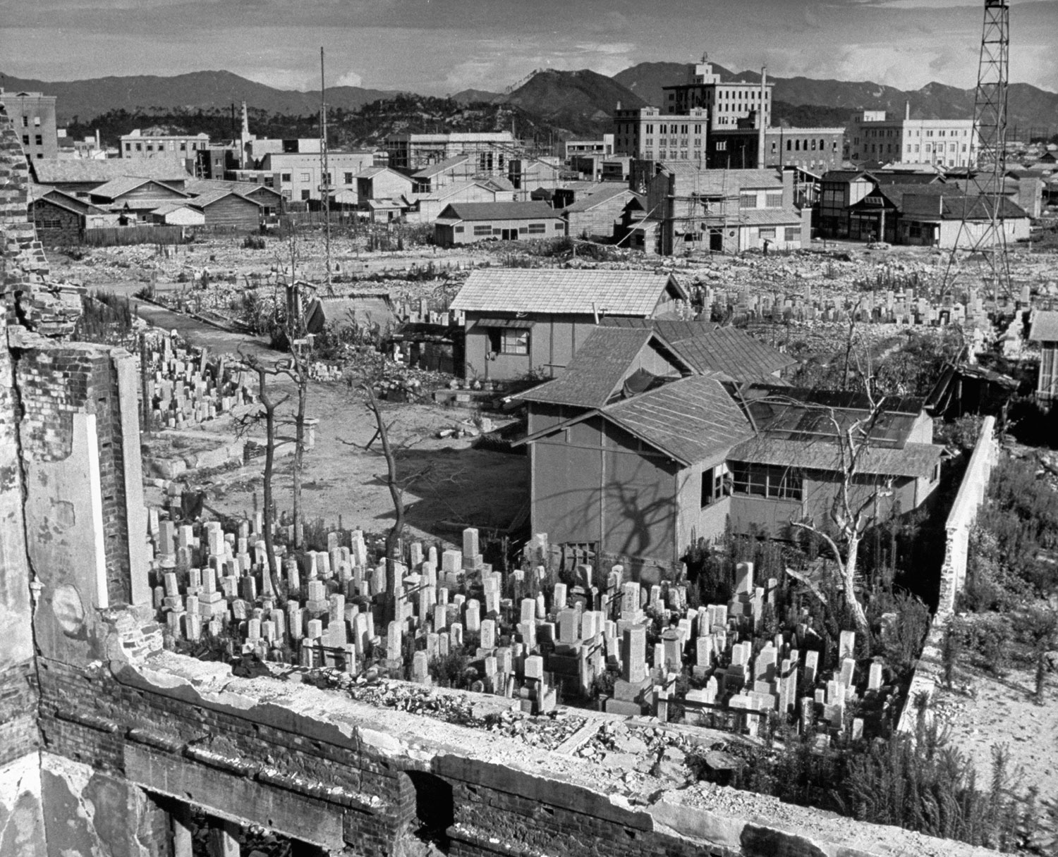 Small homes being built within a Hiroshima cemetery, 1947.
