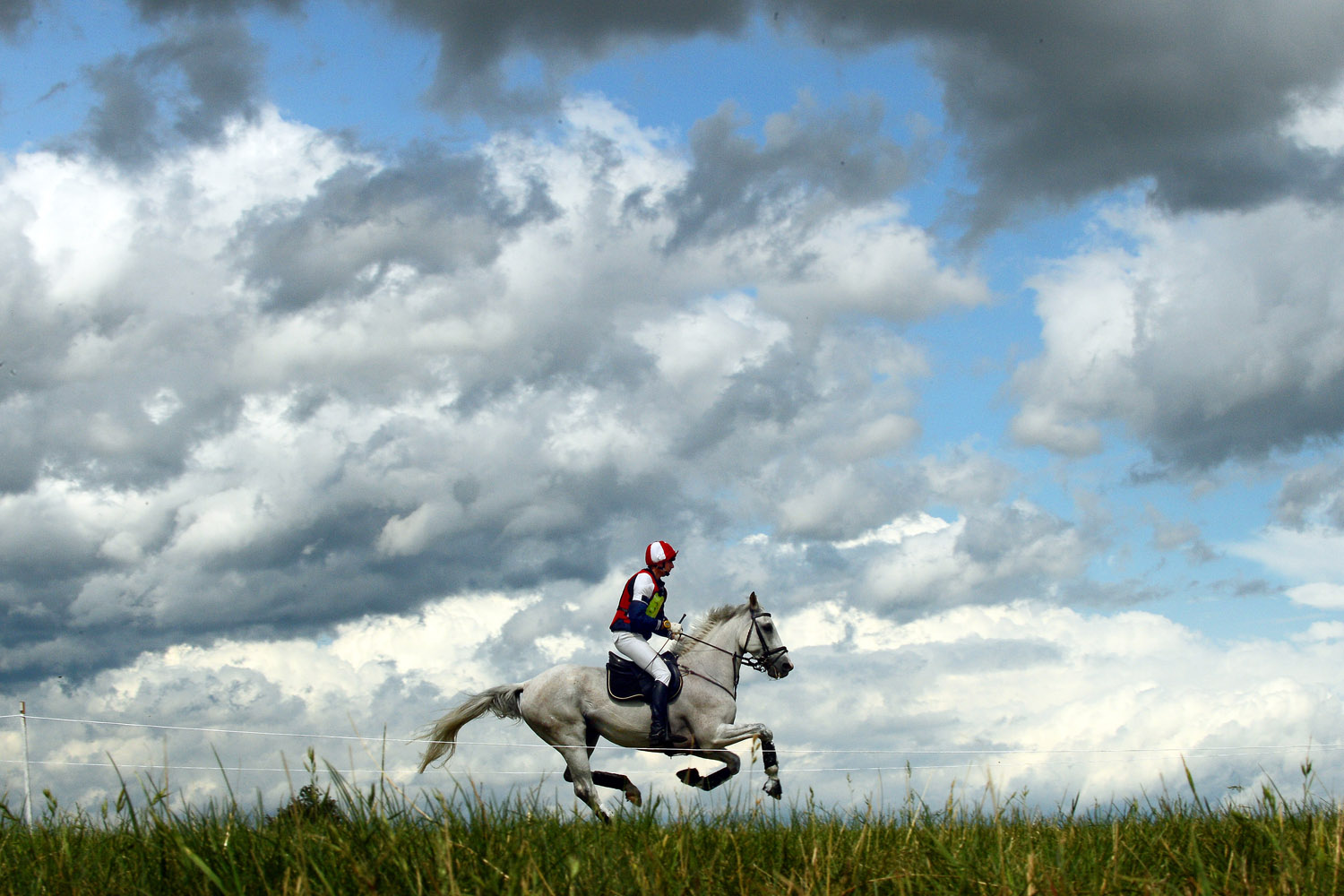 July 13, 2012. An equestrian rides his horse during an eventing competition in Baborowko, Poland.
