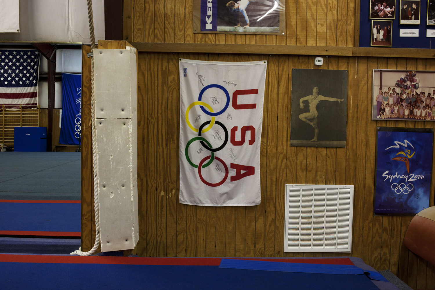 A wall displays mementos from past Olympians groomed for victory at Karolyi's Camp.