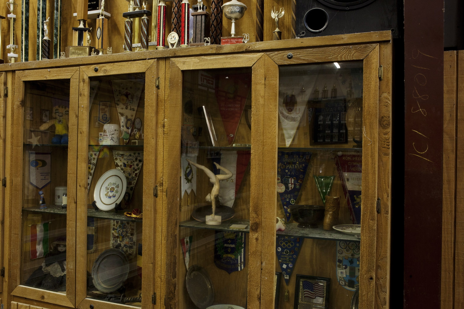 A display of gymnastics trophies and awards at Karolyi's Camp.