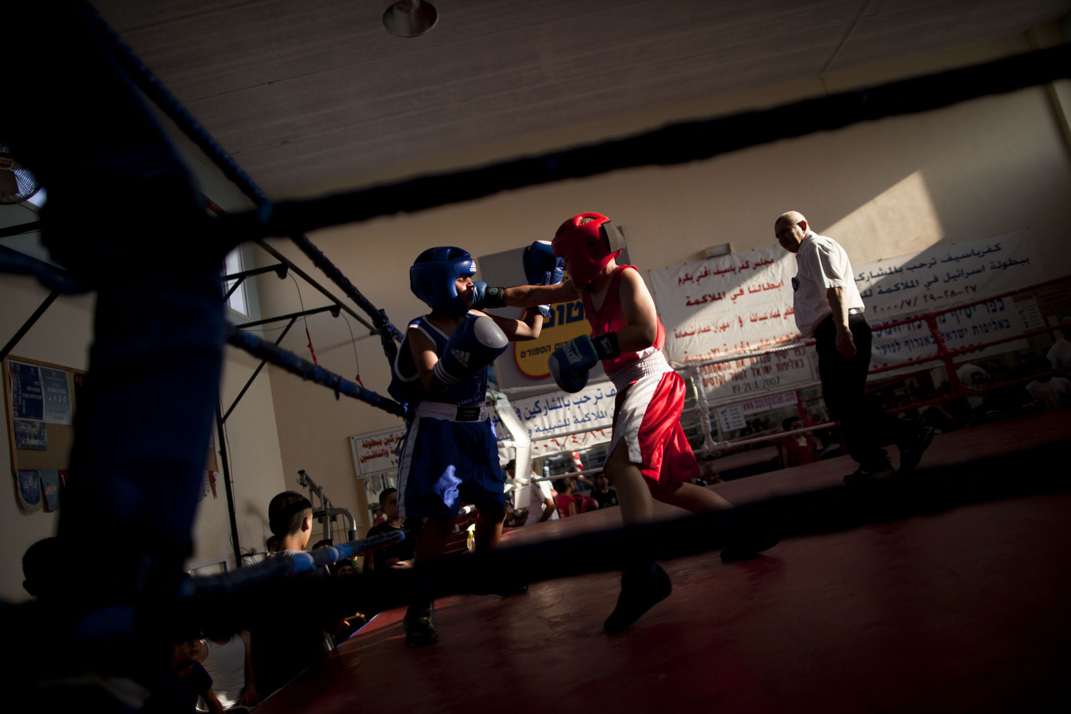 Israeli and Israeli Arab boys fight during Israel's National Youth Boxing Championship in the Arab village of Kfar Yasif, northern Israel.