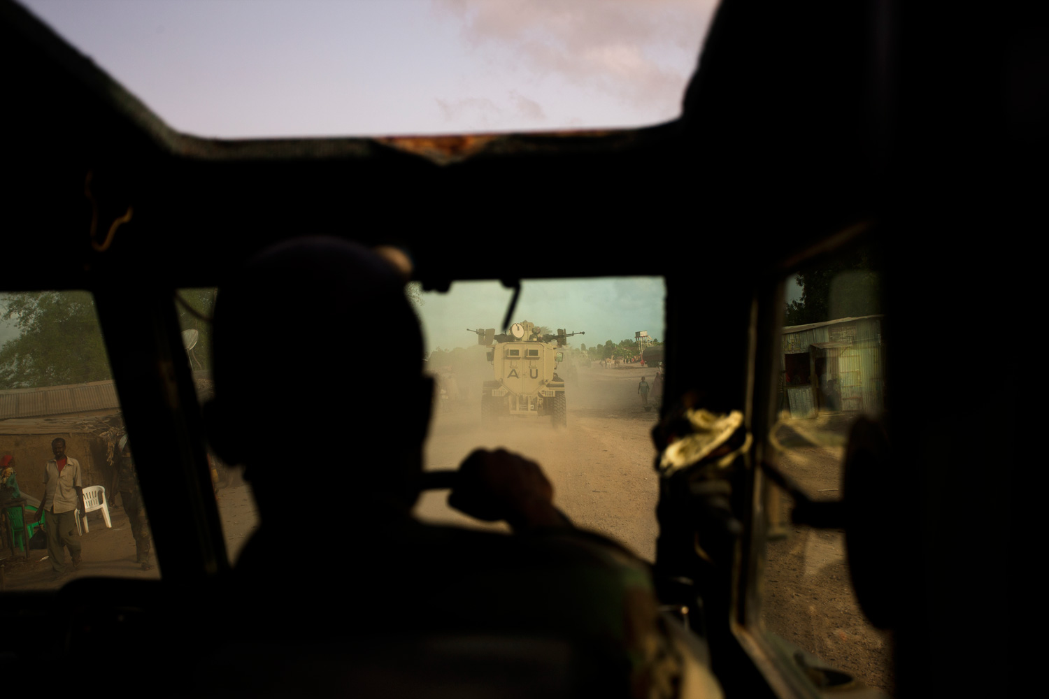 A view from inside an African Union armored vehicle along the Mogadishu-Afgoye road in Afogye, where attacks from Al-Shabaab are frequent.