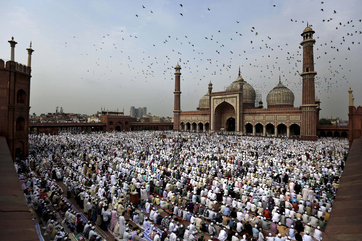 Aug. 20, 2012. Indian Muslims take part in Eid al-Fitr prayers at Jama Masjid in New Delhi.