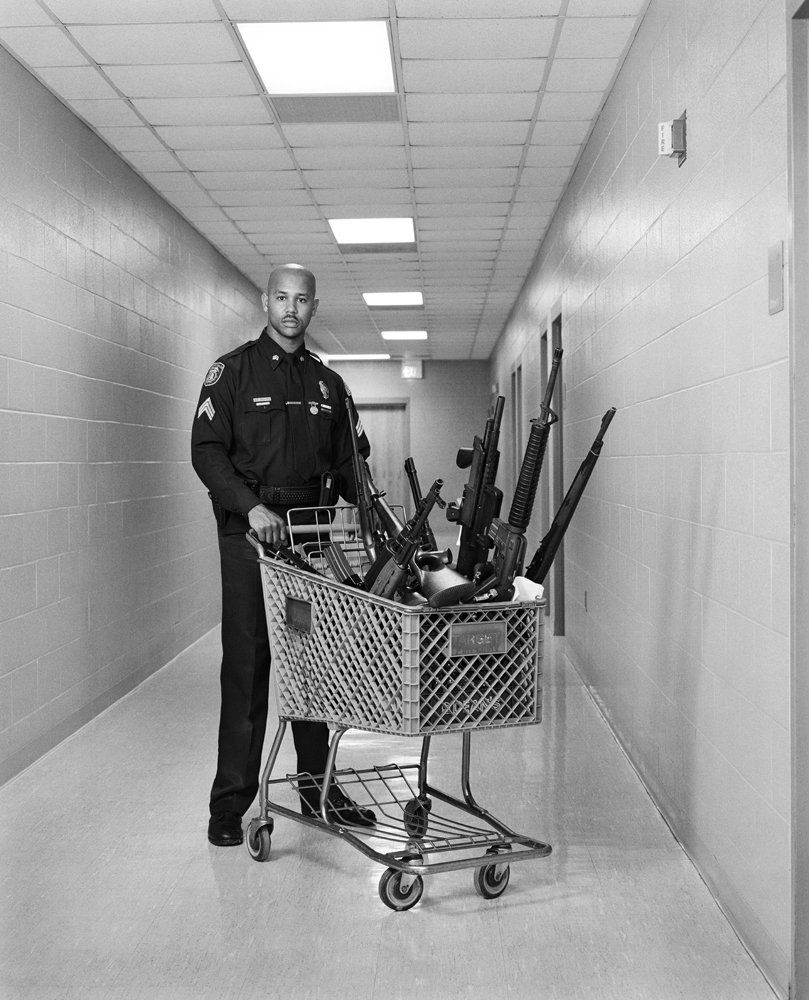 Sergeant Michael Rallins of Memphis Police Firearms Center, with weapons confiscated from streets and homes of Memphis residents.  We've seen just about everything... M-16 assault rifles, AR-15's semi-auto's, hunting rifles with home-made silencers, even an Armalite 5.56 Nato calibre assault rifles. These guns could have been used by anyone from petty criminals to big-time drug dealers... they could have been used in robberies, domestics and homicides.