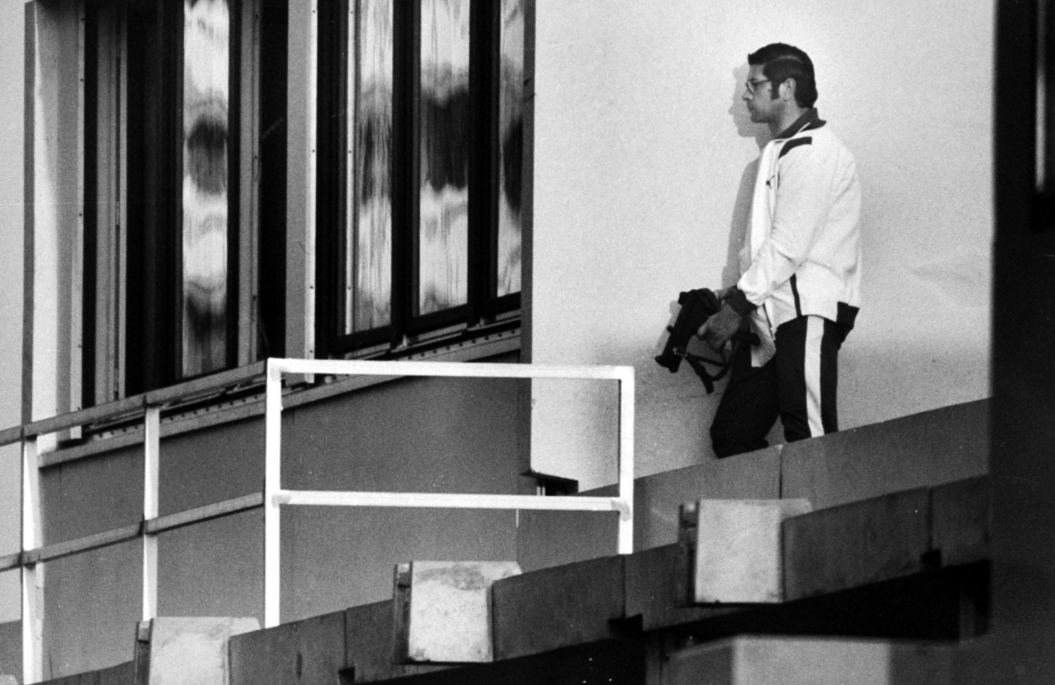 A German policeman leans against a wall outside an apartment where Israeli hostages are held, Munich, September 1972.
