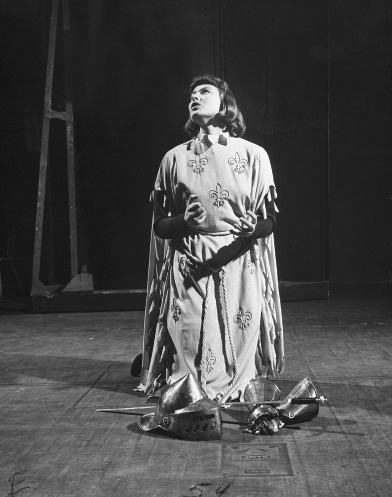 Ingrid Bergman as Joan of Arc praying for guidance during a scene from the Broadway production of Maxwell Anderson's 1946 play, Joan of Lorraine, for which Bergman won a Tony.