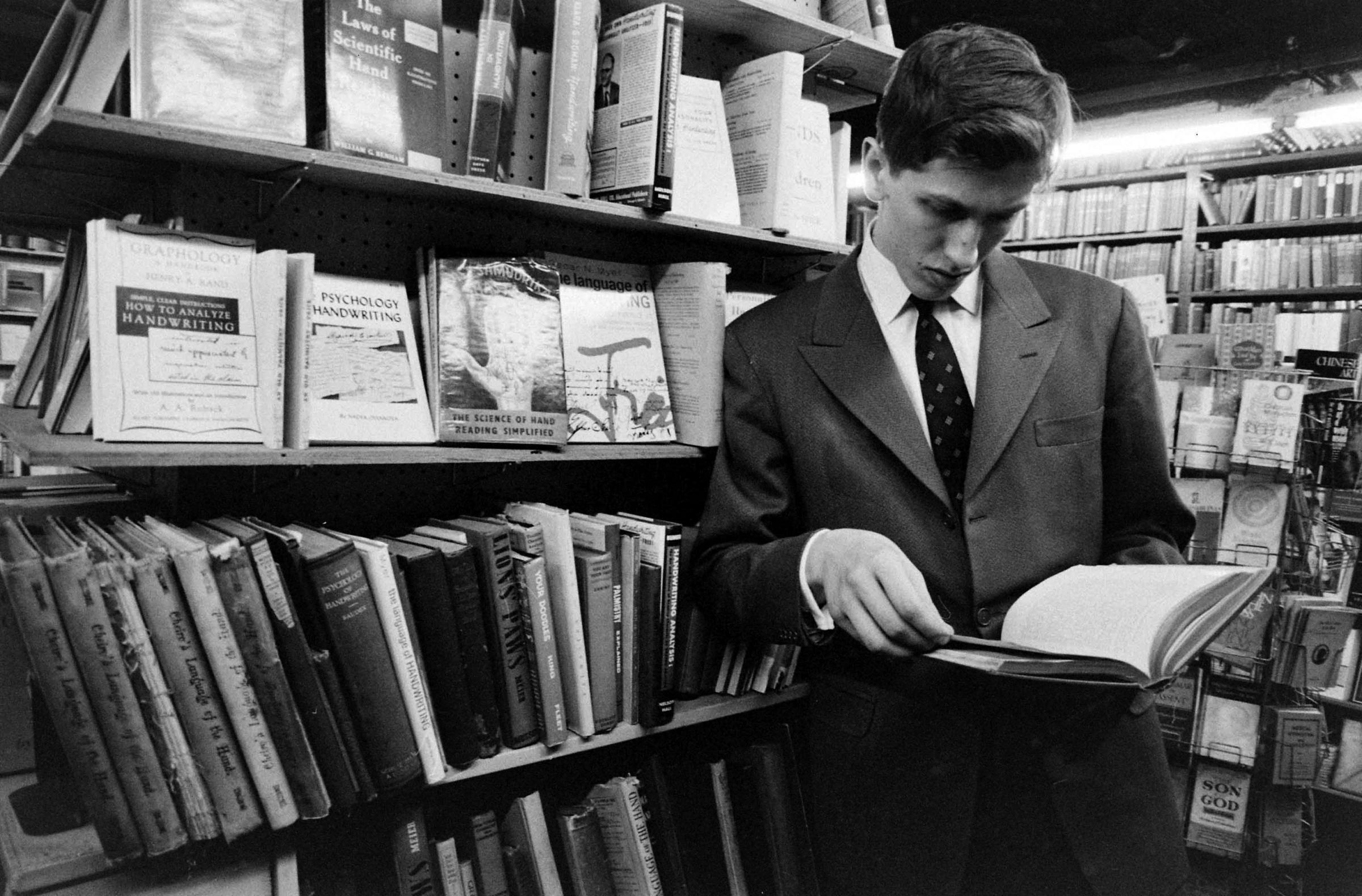 Bobby Fischer in a used bookstore, New York, 1962.