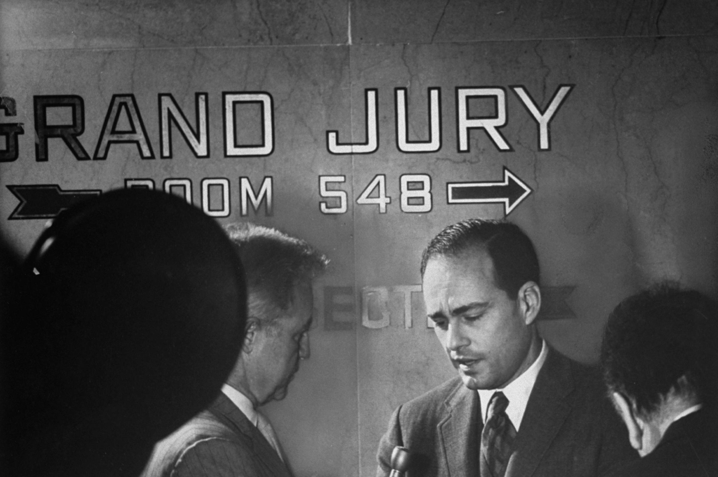 Deputy district attorney Vincent Bugliosi in the Los Angeles Hall of Justice being interviewed at the beginning of grand jury hearings in the Tate-LaBianca murders, 1969.
