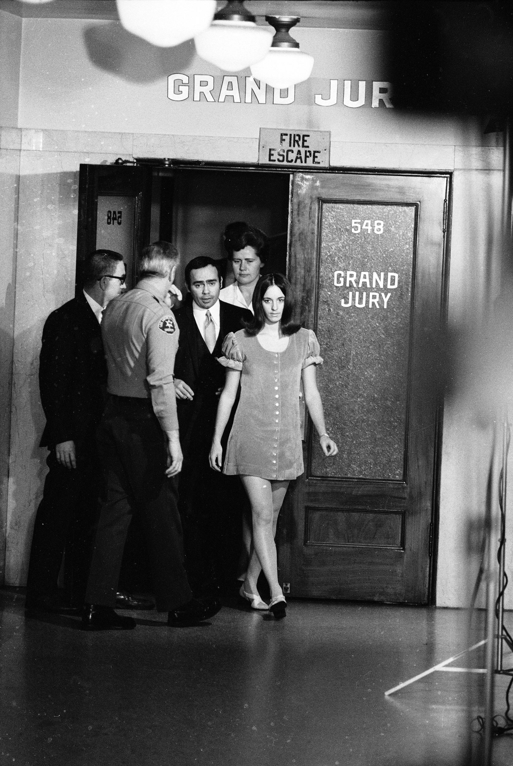 Manson Family member Susan Atkins leaves the Grand Jury room, Los Angeles Hall of Justice, December 1969.