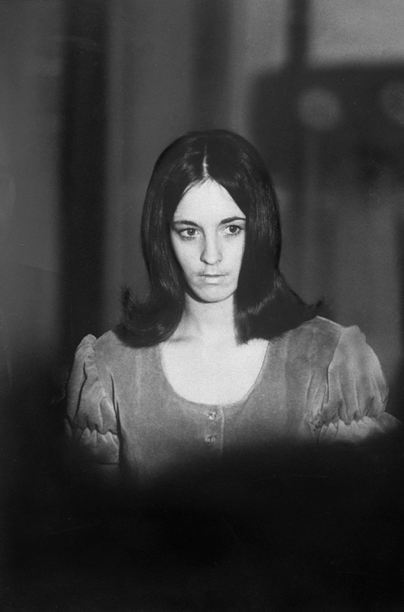 Manson Family member Susan Atkins, 21, emerges from a Los Angeles courtroom after grand jury testimony, December 1969.