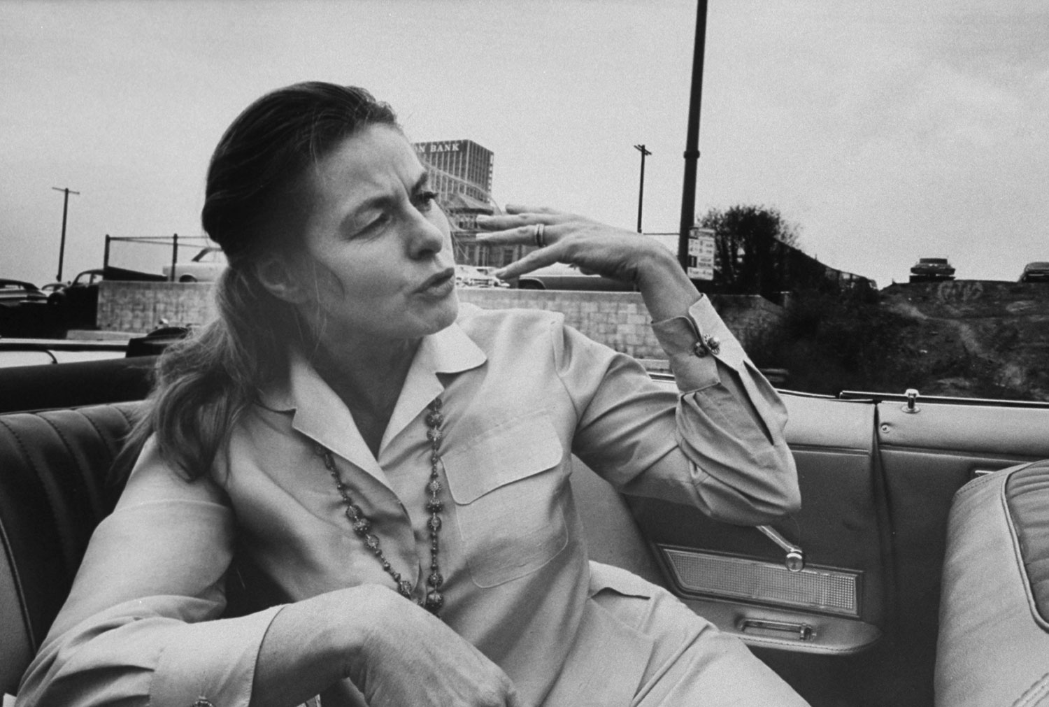 Absorbed in conversation, 52-year-old Ingrid Bergman rides through Los Angeles on her way to the theater where she'll perform in Eugene O'Neill's play, More Stately Mansions, in 1967.