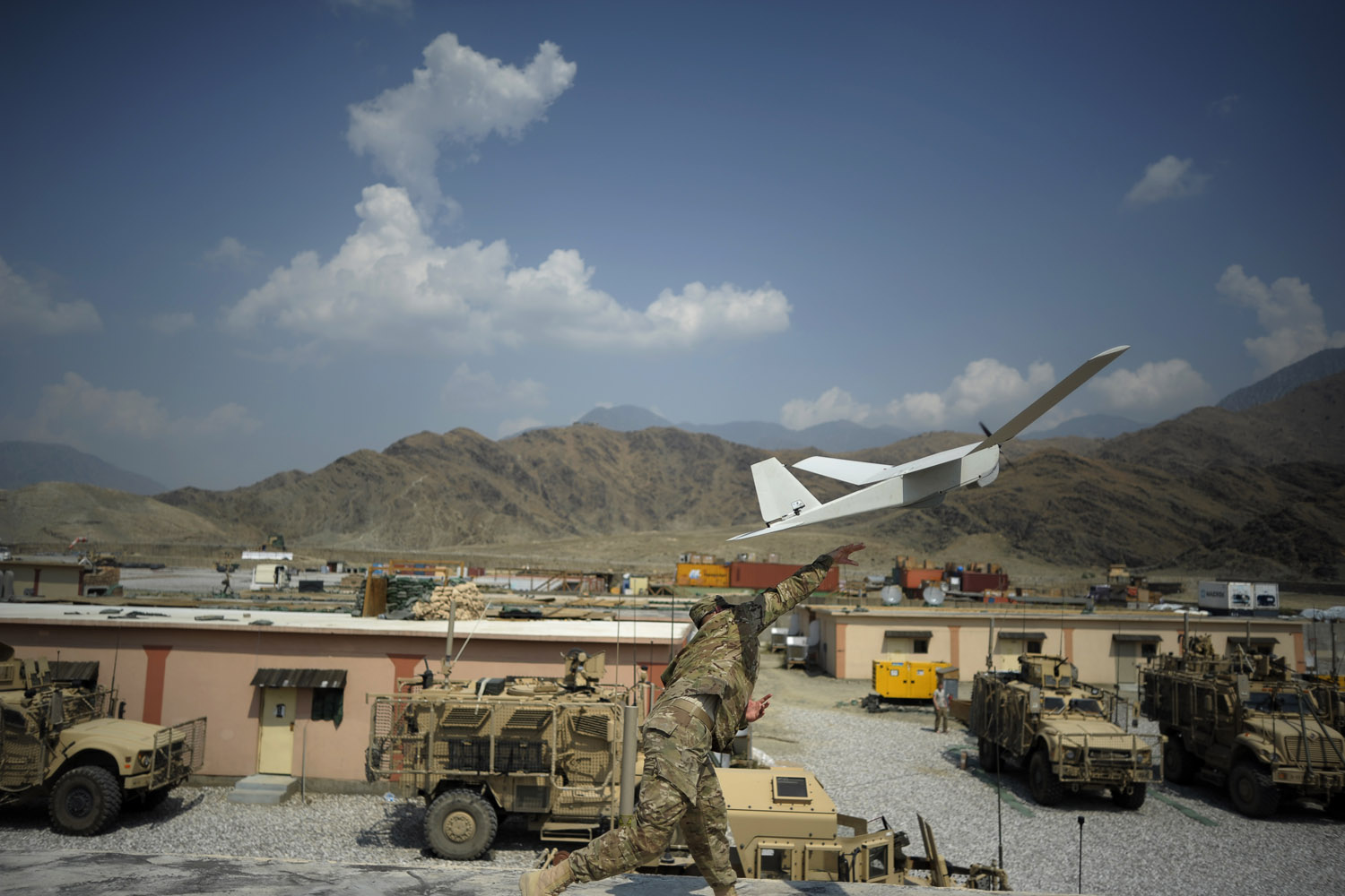 Aug. 20, 2012. U.S. Army Liutenant David Mc Curdy launches a Puma Dorin airplane at the Forward Operating Base Joyce in Kunar province, Afghanistan.