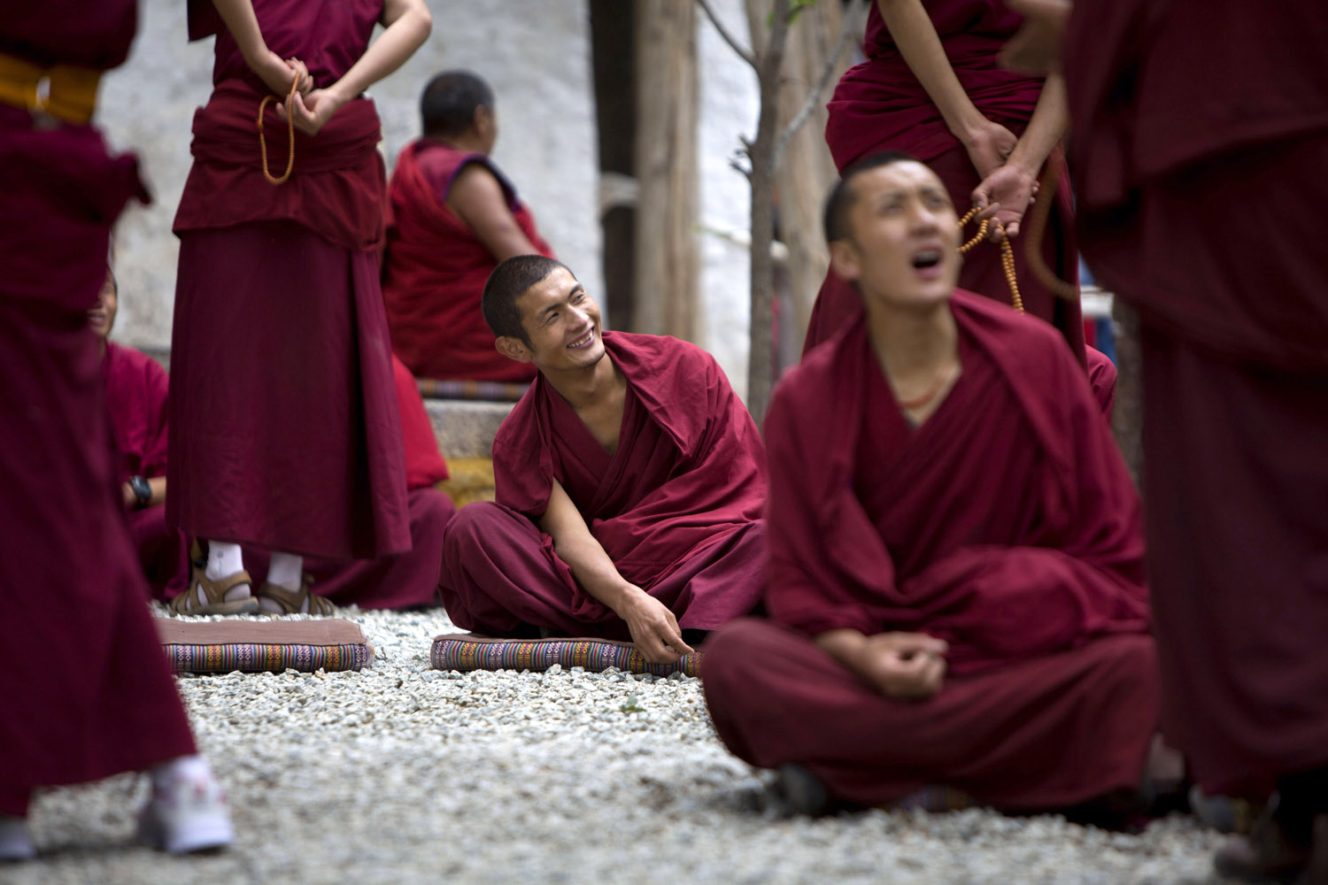 Aug. 20, 2012. Tibetan Buddhist monks debate Buddhist related issues in the courtyard of the Sera Monastery on in Lhasa, Tibet.