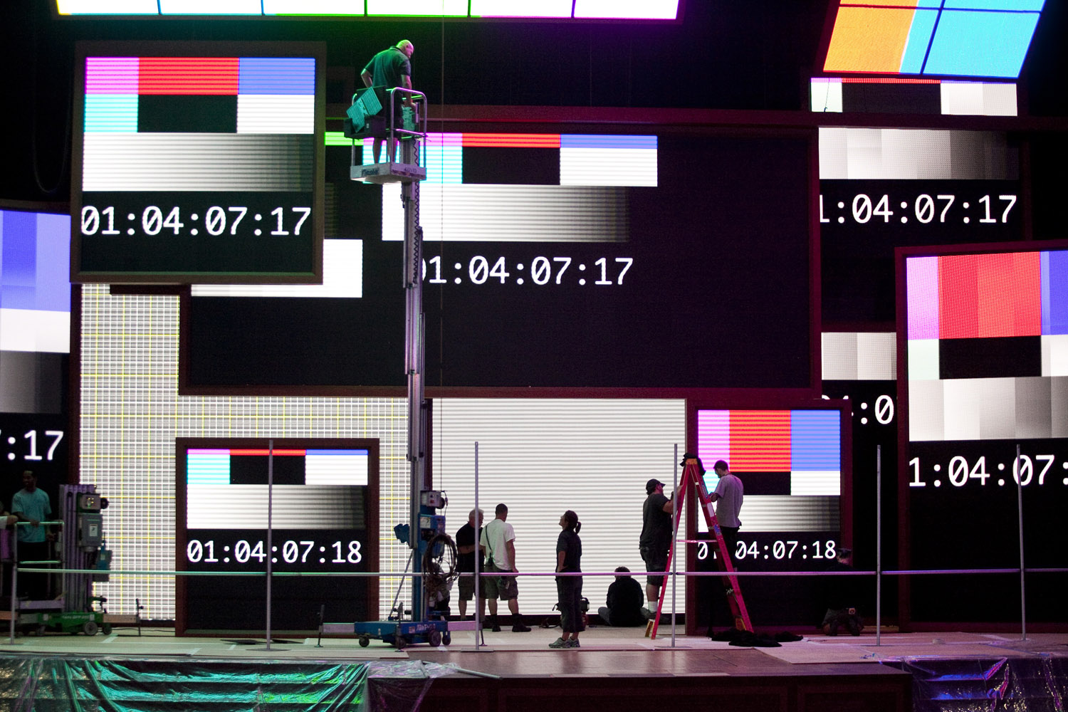 Aug. 13, 2012. Workers finish construction on display screens on stage at the Republican National Convention at the Tampa Bay Times Forum in Tampa, Fla.