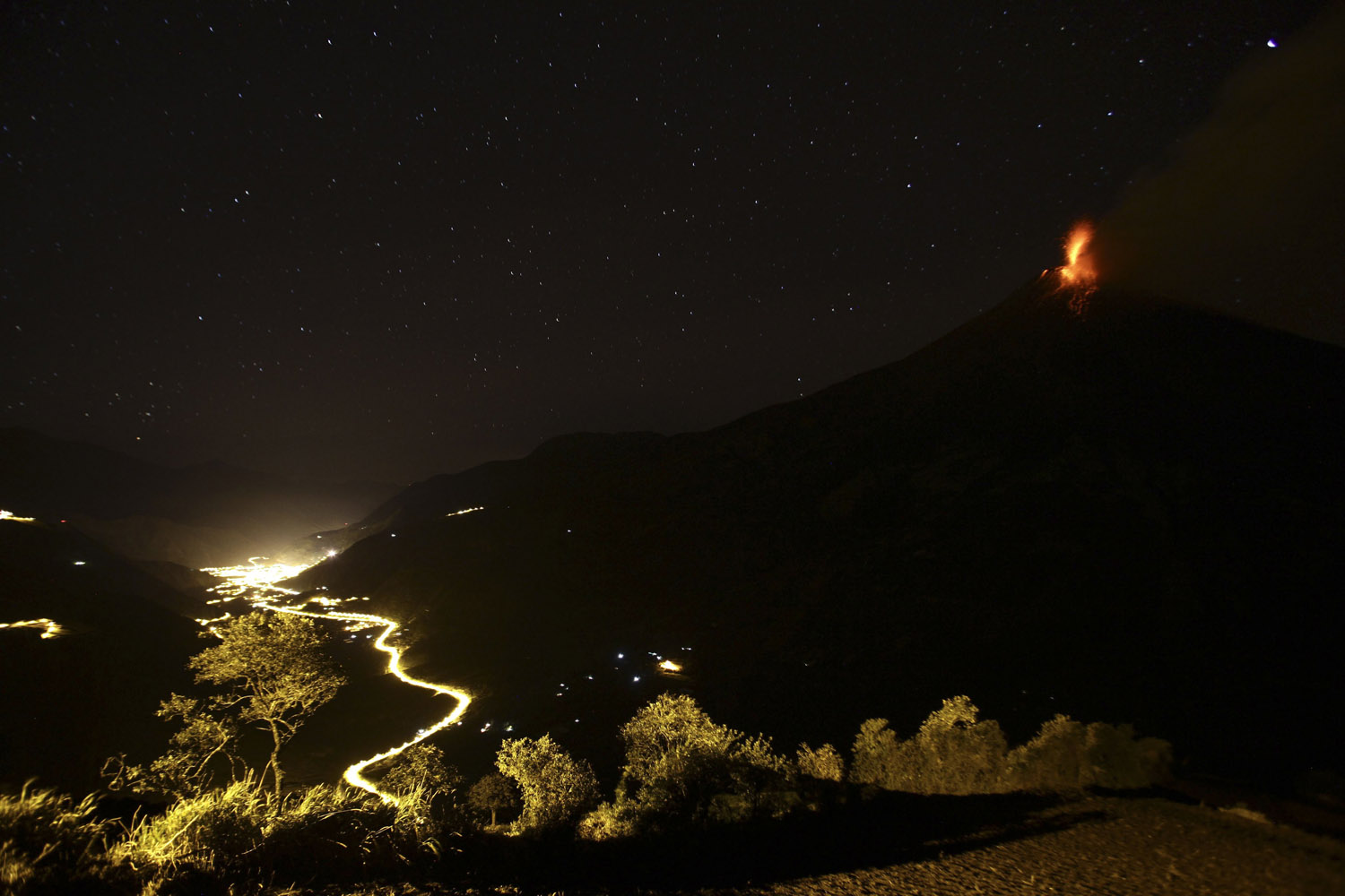 Aug. 21, 2012. Ecuador's Tungurahua volcano spews ash on the nearby town of Banos. The authorities are encouraging residents living near the volcano to evacuate.