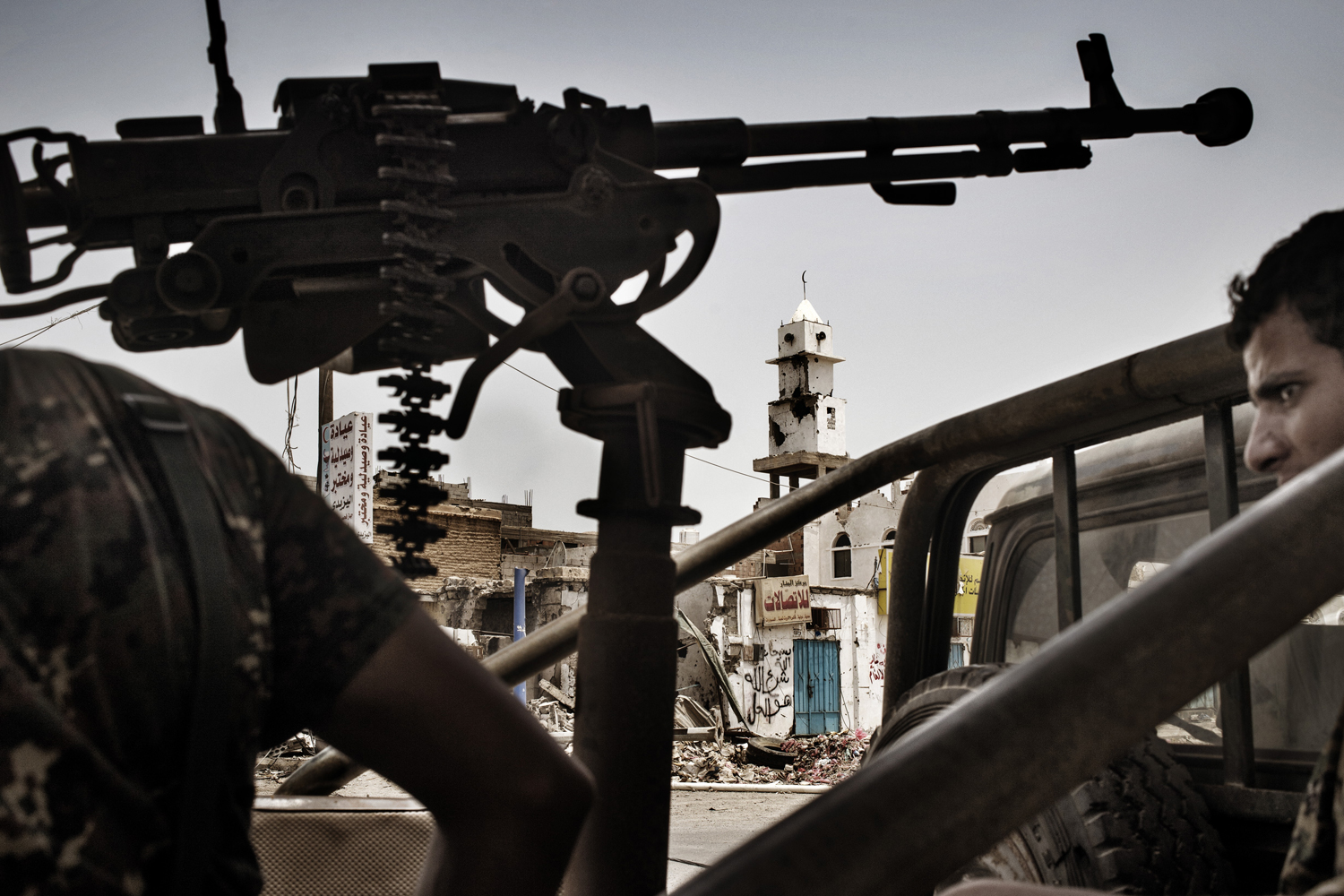 Members of Yemen's Central Security Force (CSF) patrol the streets of Zinjibar.