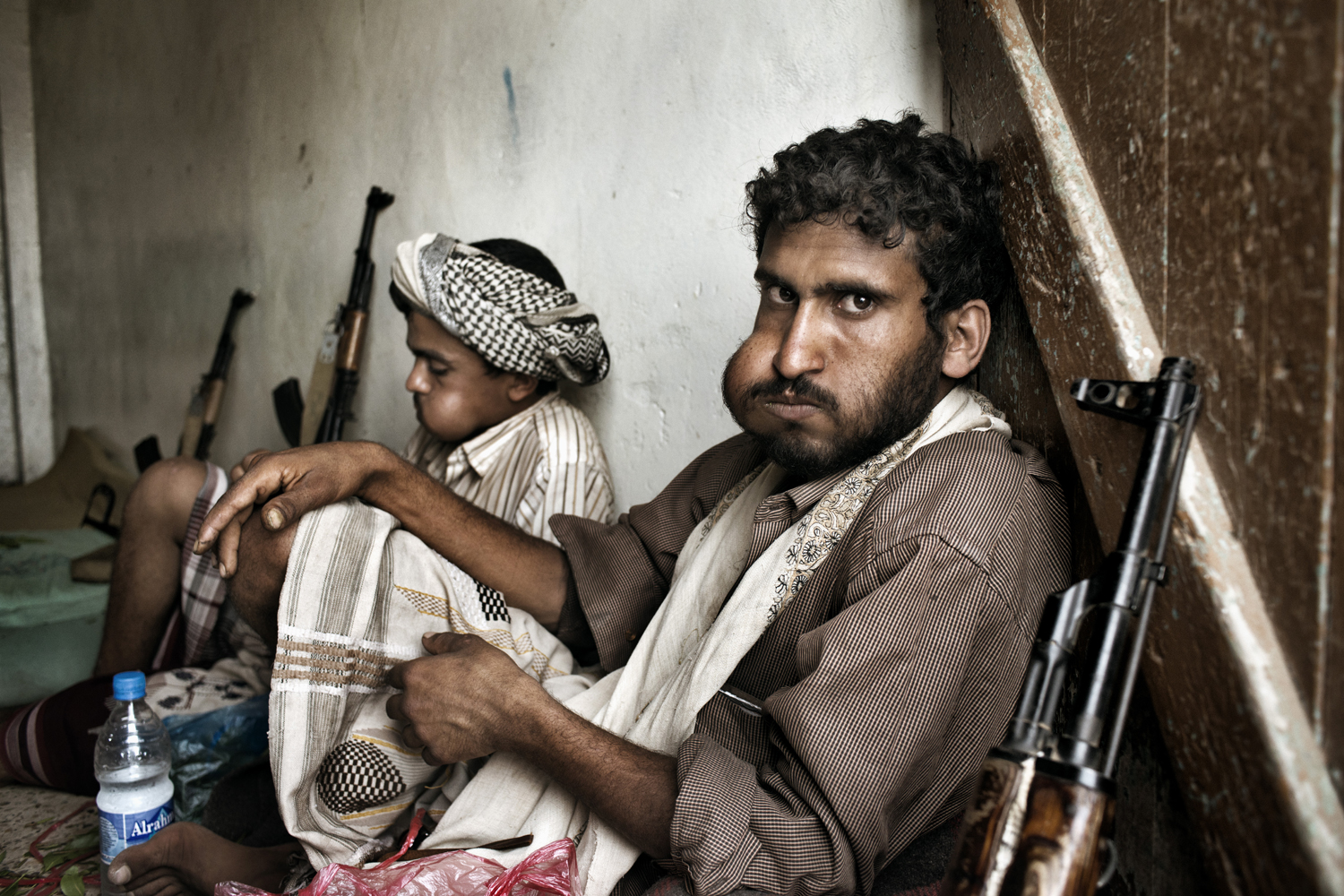 Soldiers from Yemen's CSF take a mid-afternoon break to chew qat.