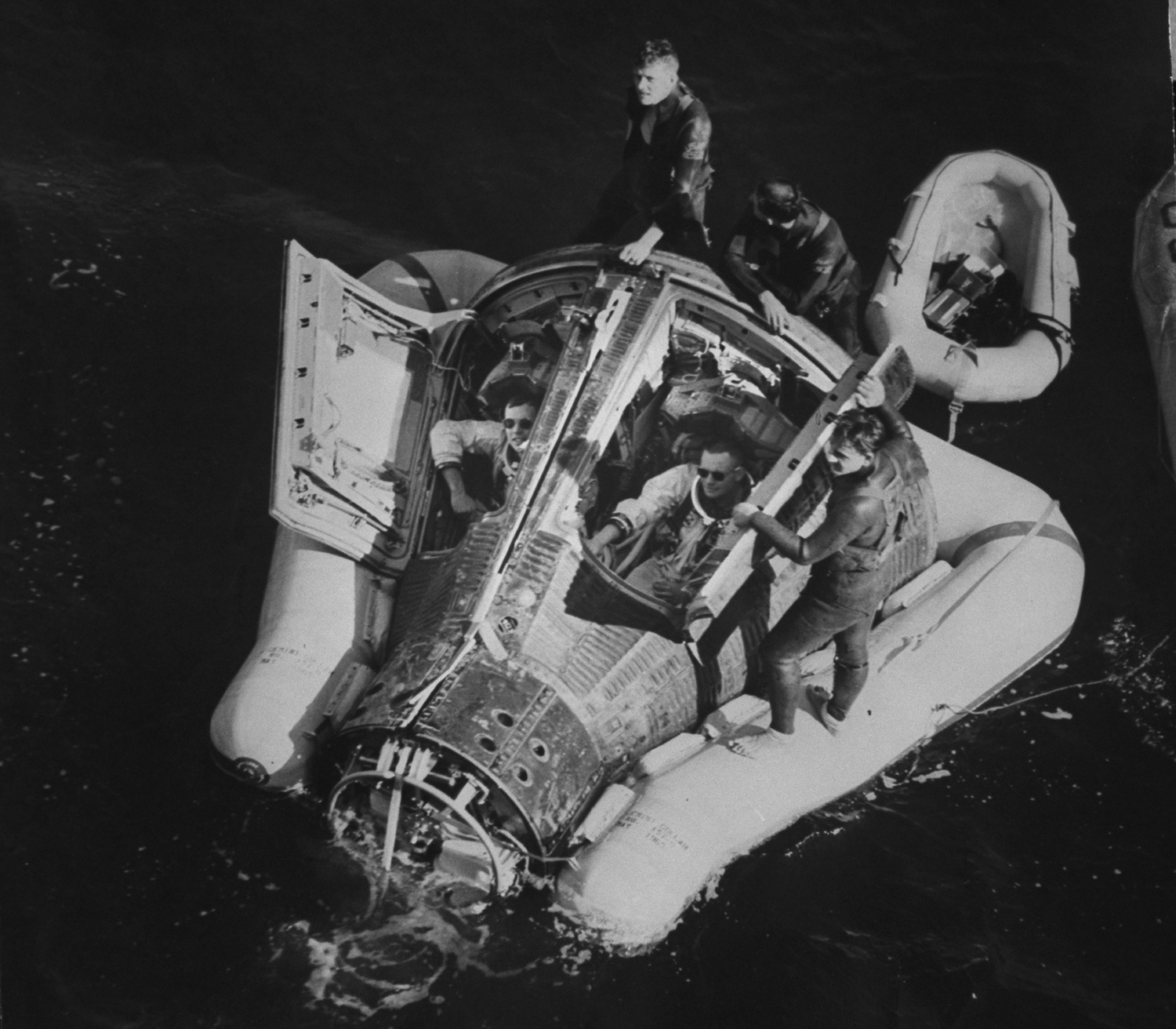 Gemini 8 astronauts Neil Armstrong and David Scott, floating in the Pacific after splashdown, 1966.