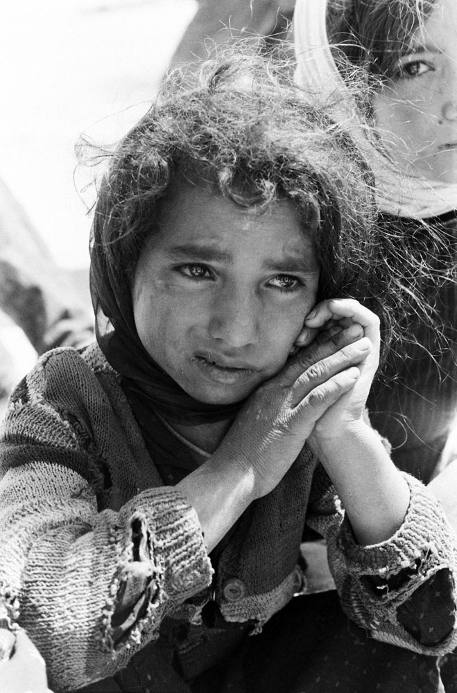 Young survivor photographed in the aftermath of a September 1962 earthquake in northwestern Iran.