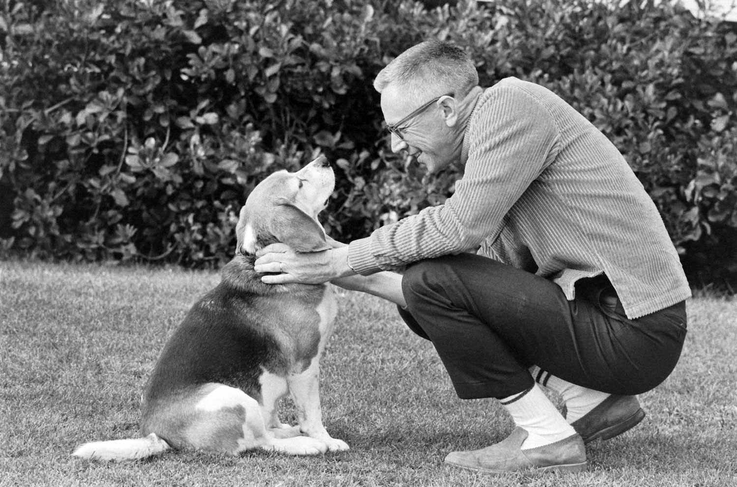 Charles M. Schulz with one of his family's five dogs in California in 1967.