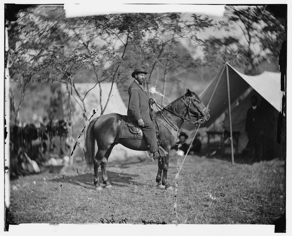 Allan Pinkerton ( E. J. Allen ) of the Secret Service on horseback.
