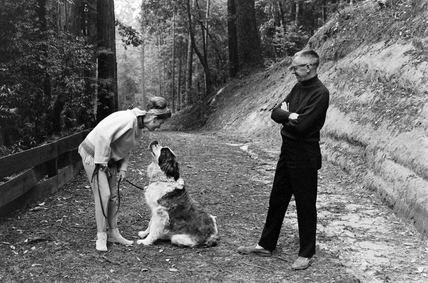 Charles Schulz with his first wife, Joyce, and one of his family's five dogs in California in 1967.