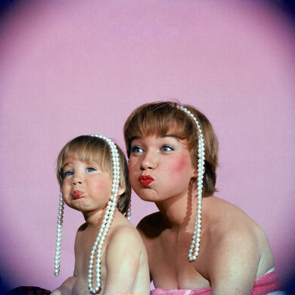 Shirley MacLaine and her daughter Sachi Parker playfully pout, 1959.