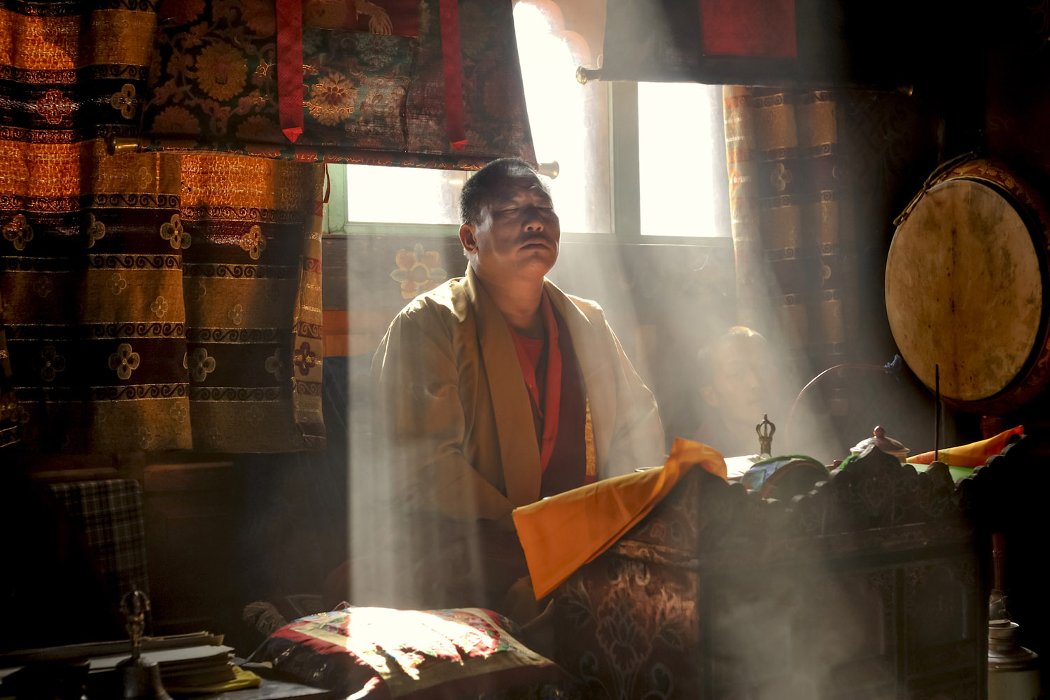 1989: David ButowA monk meditates during a two-day prayer at a private home in Paro, Bhutan. The blessing is intended to instill harmony and good luck, and is part of an annual ritual by many families in this Asian country, where Buddhism is the official national religion. Photographed in 2012, the image is a from a series for the photographic work-in-progress Seeing Buddha, which will be released next year.
                              
                              
                               Just out of college, it was the first time I had been around so many established, highly-regarded photographers and editors. I was struck by how integrated their personalities were with their professional lives. They put so much of themselves into their work, and were in turn shaped by the experiences of being around powerful people or doing exotic or dangerous travel, things most people will never see first hand. I realized then that working at that level was not just a job—it was a life.