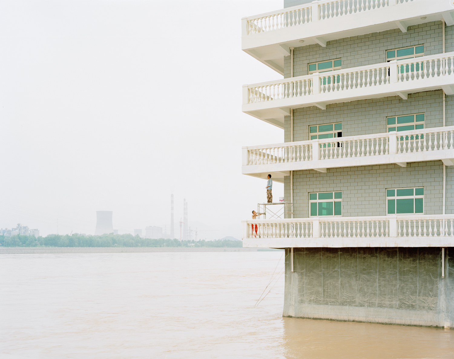 image: A building immersed in the river, Gansu province.