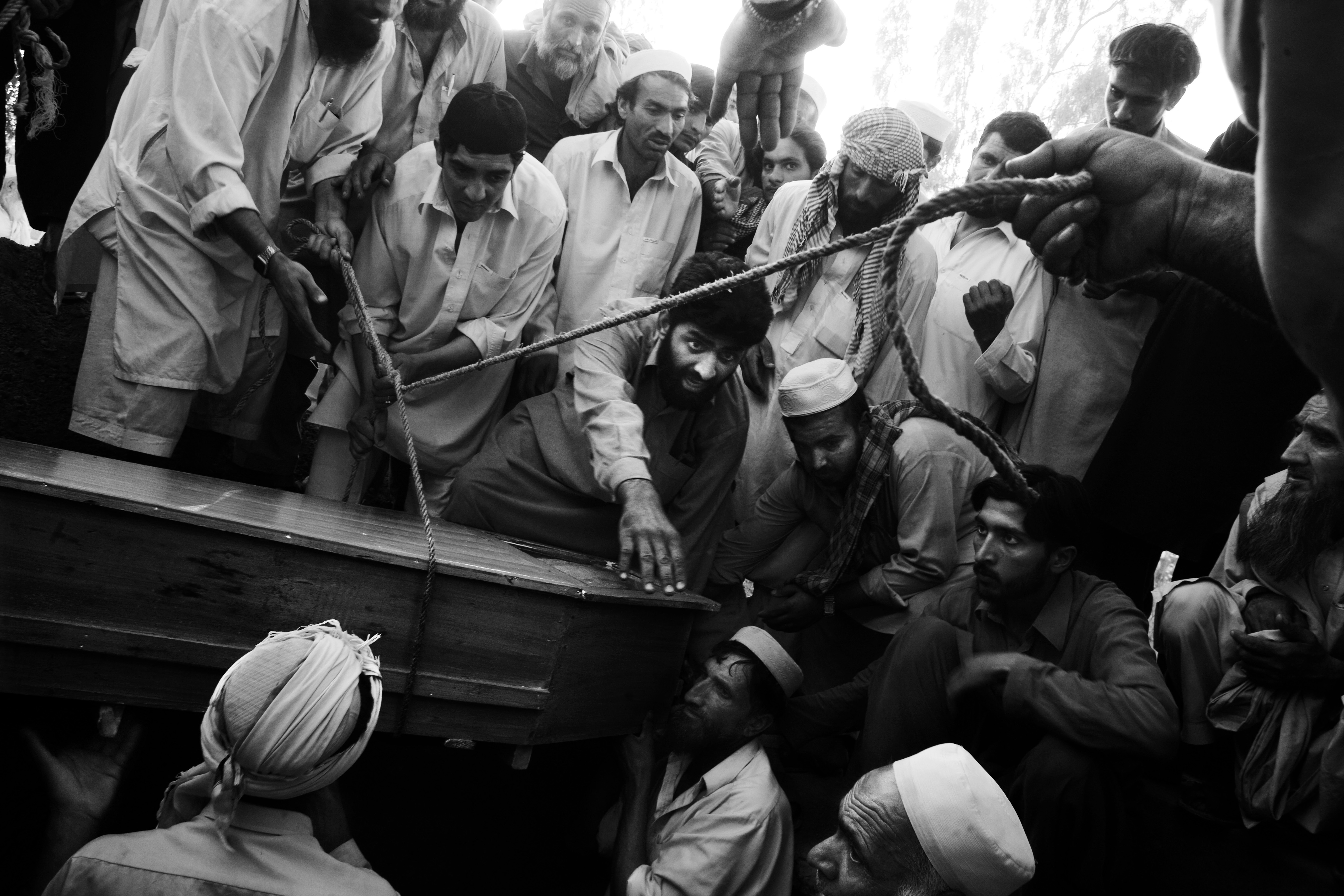 A funeral for a man killed in a suicide blast in an open market in Peshawar. June 2009.