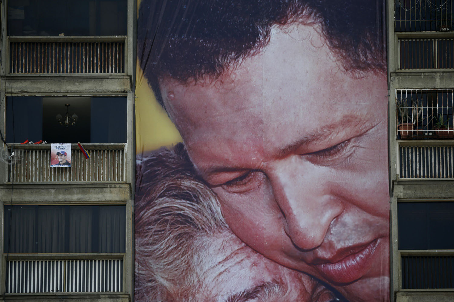 Oct. 6, 2012. A campaign poster of Venezuelan President Hugo Chavez is seen on an apartment building in Caracas.