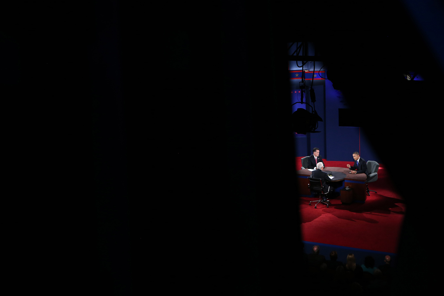 Image: President Barack Obama and Republican Presidential Candidate Mitt Romney participate in the final Presidential debate with moderator Bob Schieffer on the campus of Lynn University in Boca Raton, Fla.